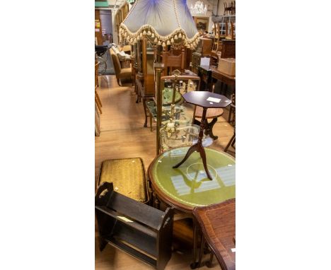 A collection of furniture comprising: a brass standard lamp; brass glass-topped coffee table (as found); oak small book rack;