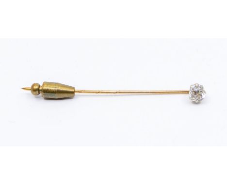 A diamond and yellow metal stick pin, comprising a claw set old nine cut diamond weighing approx 0.60ct, unmarked yellow meta