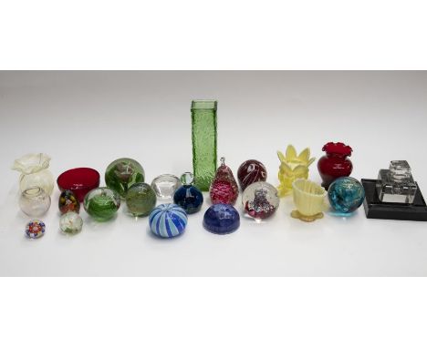 A collection of glass paperweights including Mdina coloured glass, posy vases, glass inkwell etc