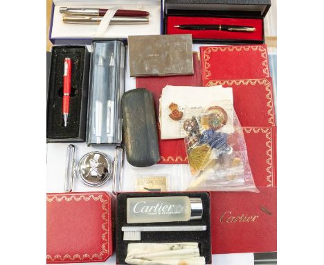 A pair of 19th century yellow metal framed spectacles; a bine needle case; Royal Gurkha Rifles belt buckle; military brooches
