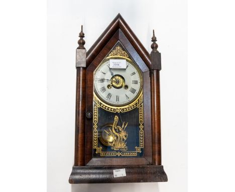 A good American mantel clock in the Gothic style. Two train movement striking on a bell, 4.5 inch dial with centre numeral di