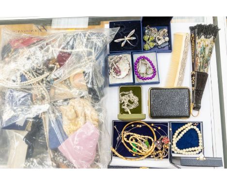 A collection of vintage costume jewellery to include Swarovski bangle, Swarovski dragon fly brooch, Swarovski crystal pen, ti