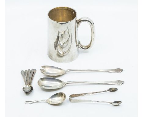 A collection of hallmarked silver including a set of 6 teaspoons, a caddy spoon, servers, tongs and a tankard (6)