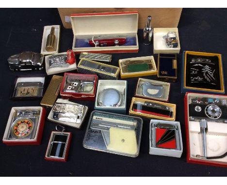 A qty of vintage lighters, mostly boxed, some novelty designs&nbsp;