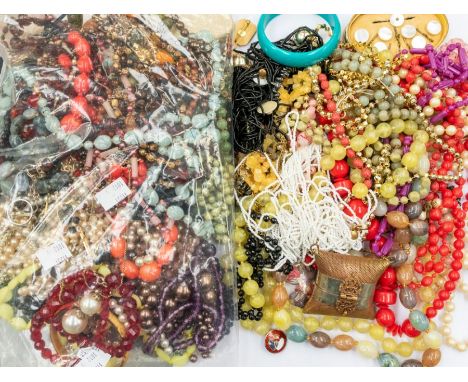 A collection of costume jewellery to include a gilt metal and paste set retractable pencil with seal terminal, agate and hema