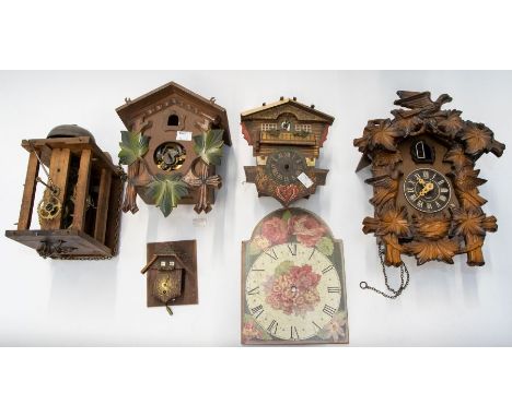 Five modern cuckoo clocks and a sheld clock for restoration and spares AF