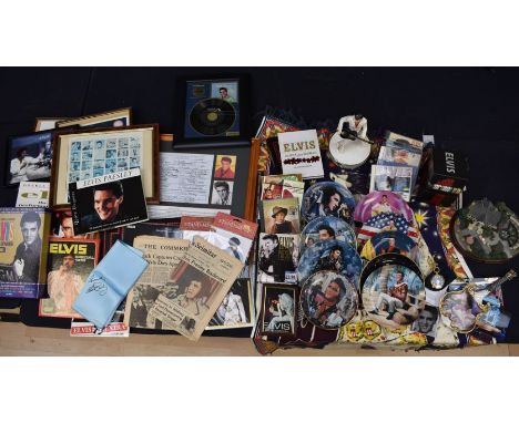 A collection of Elvis Presley memorabilia to include; musical plates, Royal Doulton figure (AF), CD's, pocket watch, framed p