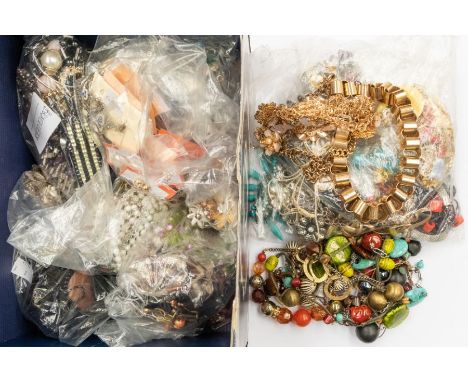 A large collection of vintage costume jewellery including necklaces, brooches, earrings, a belt etc (one large blue box)