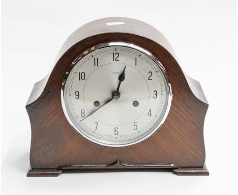Mantle clock by Enfield, two train movement, chiming on gong, 6" dial, Arabic numerals
