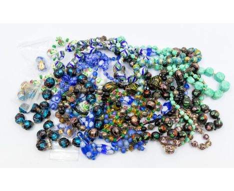 A collection of vintage glass bead necklaces, various colours and styles some with floral details, along with four pairs of m