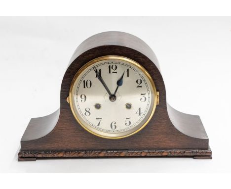 A mantle clock with two train movement, chiming on gongs, 6" silvered dial with Arabic numerals, pendulum and key present