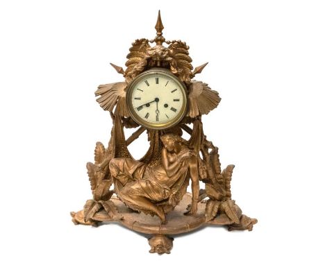 A large Victorian French spelter mantle clock, originally gilded, 5½" dial approx, with two train French movement, casting of
