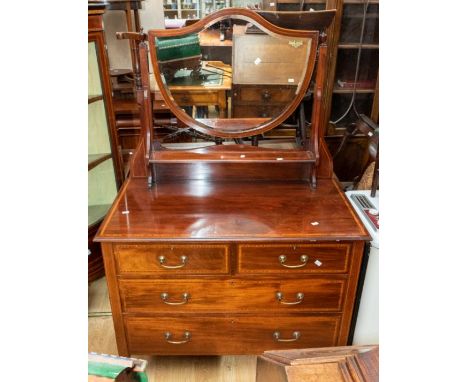 Edwardian mahogany inlaid dressing table, two short over two long drawers, with shield swing mirror