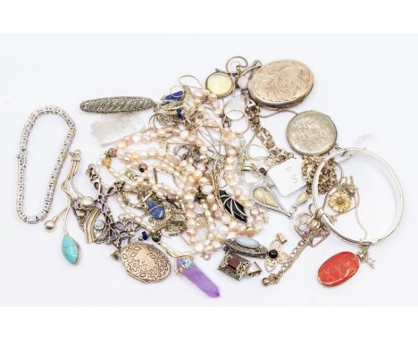 A collection of silver and gemstone jewellery to include various pendants including amethyst crystal, coral, moonstone, rose 