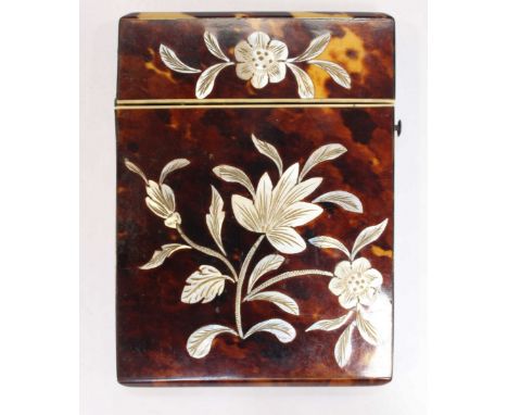 A Victorian tortoiseshell and mother of pearl calling card case.
