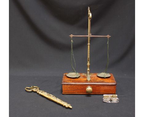 A pair of 19th century ornate cast brass and steel scissors with sheath, together with a set of Victorian brass and mahogany 