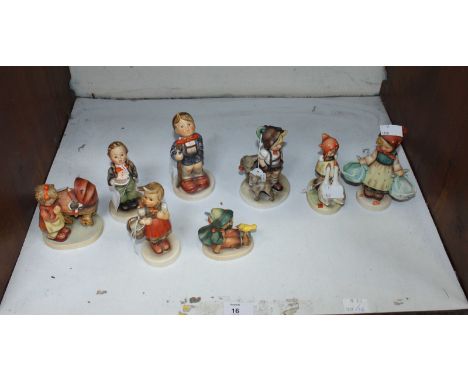 SECTION 16. A collection of 8 Goebel and Hummel figures.