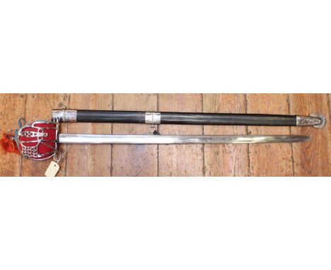 A Modern decorative sword with white-metal hilt and fittings, black leather scabbard