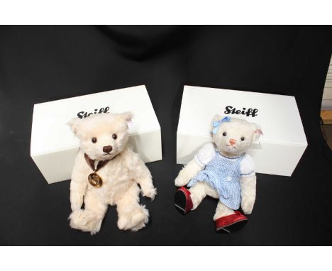 Two modern Steiff teddy bears - Dorothy Wizard of Oz musical bear, and a brown bear, both boxed.