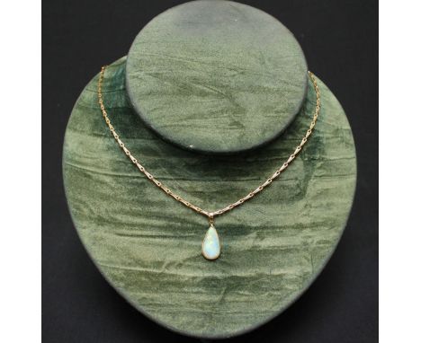 A 9ct gold and opal pendant necklace. 8.5 grams.