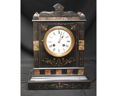 A Victorian black slate and marble mantel clock with 8-day movement striking a bell, white enamel dial with Roman numerals, 3