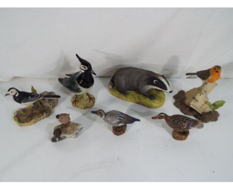 A good lot to include a Beswick pottery model of a Lapwing stamped to the base model number 2416, an Aynsley ceramic model of