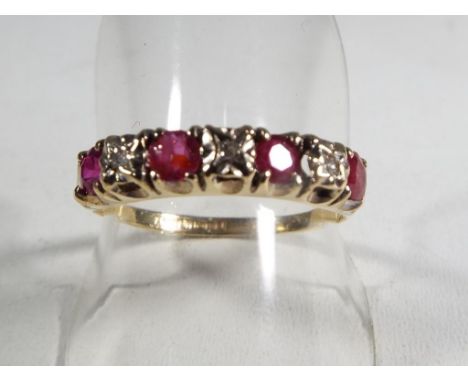 A lady's hallmarked 9 carat yellow gold ruby and diamond ring, size Q and a half, approximate weight 2.05 grams. Estimate £30