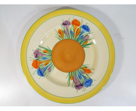 Clarice Cliff - a large plate by Clarice Cliff in the Crocus pattern, stamped to the base, approx 20cm (diam) Est £25 - £40