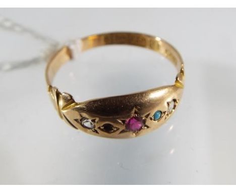 A 15ct rose gold ring, 6.5mm wide, set with five stones comprising central Ruby, two Turquoise and two spinels, all star set 