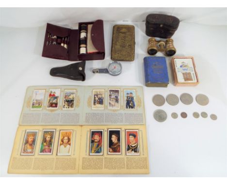 A good lot to include two vintage cigarette card albums, one entitled The Kings and Queens of England 1066 - 1935 by John Pla