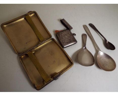 A small parcel of hallmarked silver to include a cigarette case, a vesta and three spoons, various assay marks