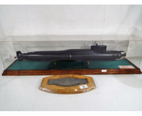 A 1:200 scale model of a Russian submarine in display case, with presentation inscription, Submarine model Russian submarine 