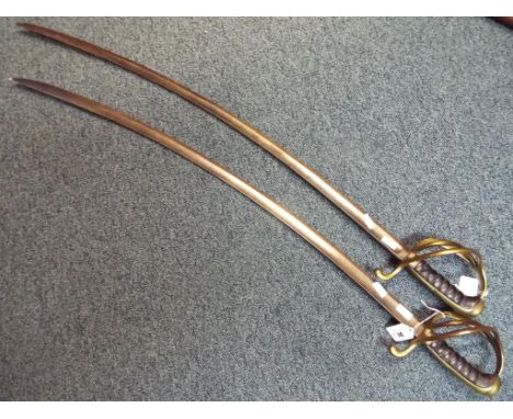 Two Light cavalry sabres marked to the ricasso PDL and wall hanging brackets. NOTE: Please read 'Important Information' conta
