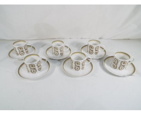 Susie Cooper - twelve pieces of Susie Cooper Venetia pattern tableware comprising six saucers and six coffee cups. Estimate £