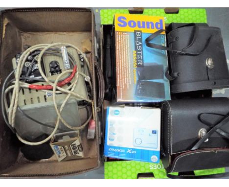 A good lot to include a quantity of photographic equipment comprising cameras, a vintage Eumig film projector, binoculars, DV