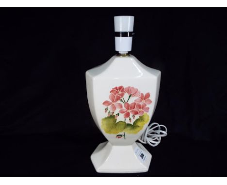 Moorcroft Pottery - a large Moorcroft Pottery ceramic lamp base in the Pink Campanula pattern on a cream ground, stamped to t