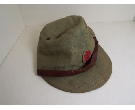World War Two (WW2) Pacific - a soft cap with leather sweatband and patch badge with character marks to the fore - NOTE: Plea