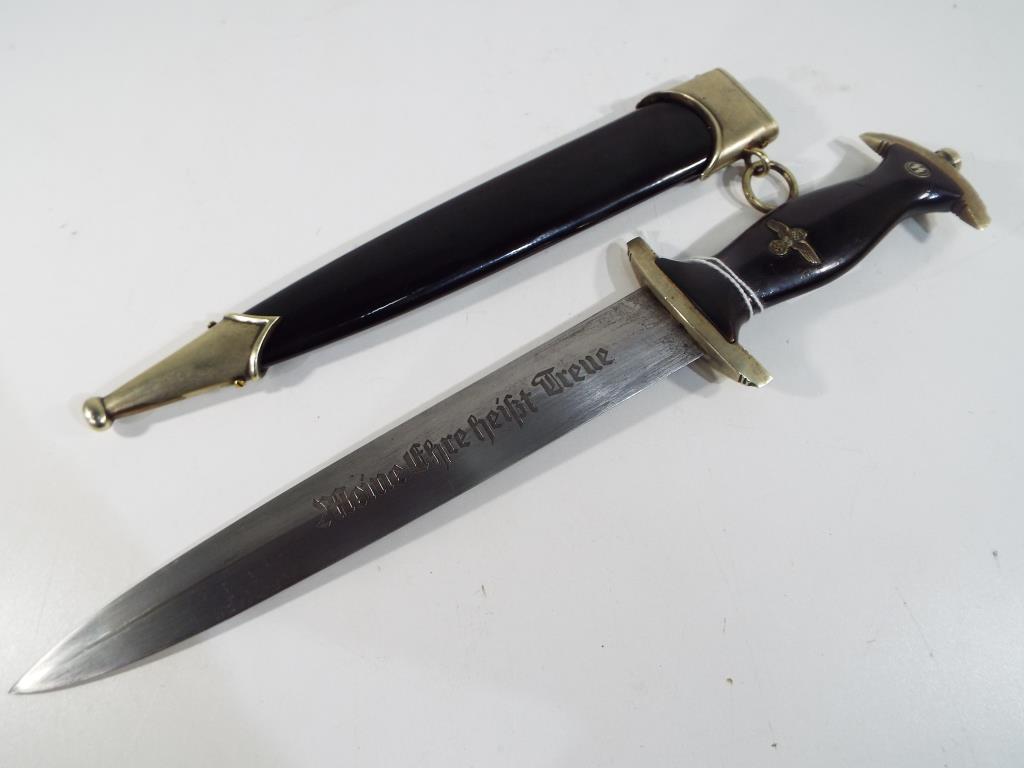 World War Two (WW2) - a German SS officer's dagger, the blade with ...