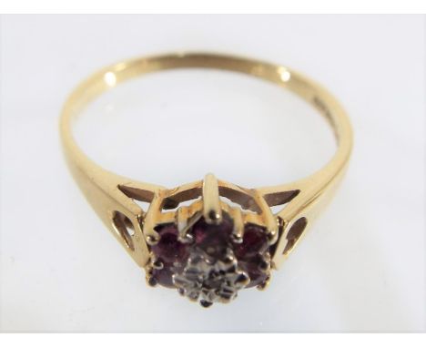 A 9 carat gold ruby and diamond ring, size R, approx. weight 2.1 grams