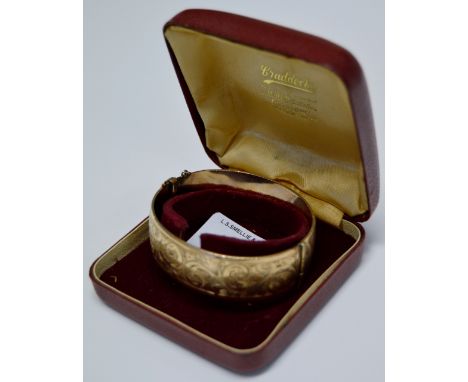 ORNATE 9 CARAT ROLLED GOLD BANGLE WITH BOX     