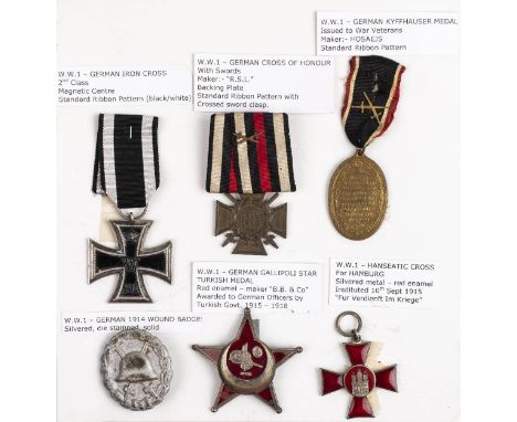 *Prussia. WWI Iron Cross, 2nd Class, ring suspension stamped '800', 45mm x 45mm, together with WWI German Cross of Honour wit