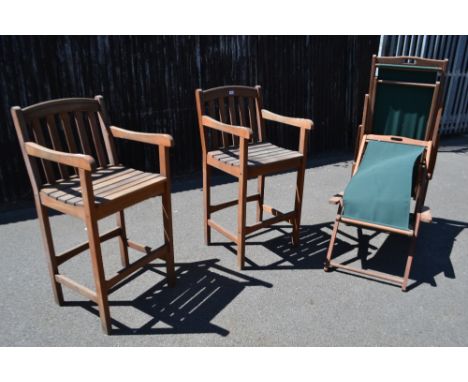 A pair of Vintage style deck chairs; a pair of folding larder chairs; a pair of garden high chairs