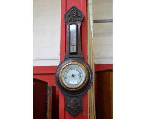A late Victorian oak aneroid barometer, c.1900