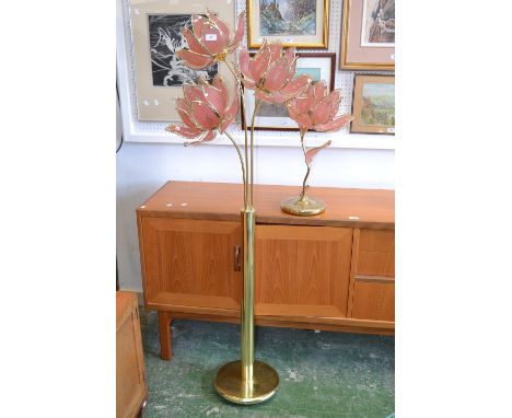 A contemporary brass and glass three light flower head standard lamp, a conforming table light  (2)