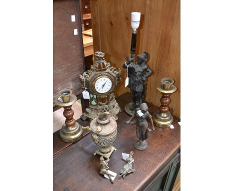 A spelter lamp base, as a Roman soldier, 50cm high;  a pair of turned treen and brass candlesticks;  a brass ovoid water heat