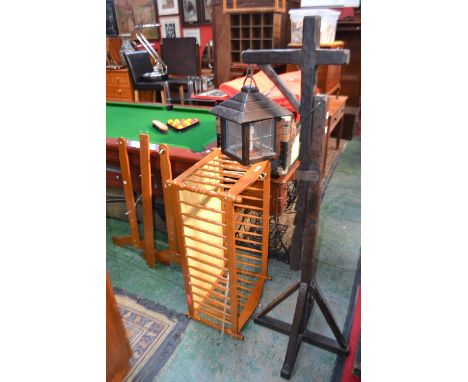 A contemporary pine swinging cot; an oak Gibbet standard lamp (2)