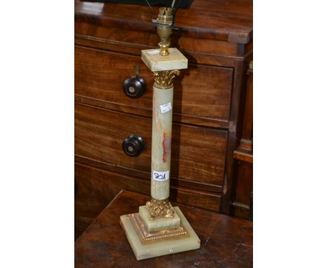 A table lamp with onyx and gilt metal mounted column.