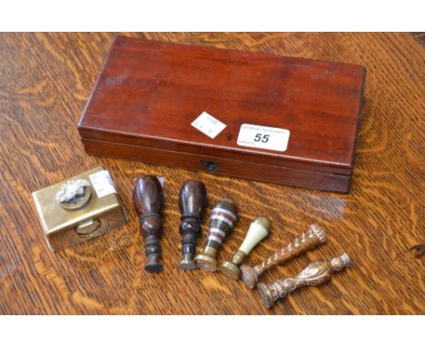 A mahogany box, with six 19th century seals and brass sealing wax lamp