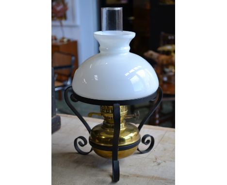 A brass oil lamp, Duplex twin burner, opaque glass shade, 41cm high