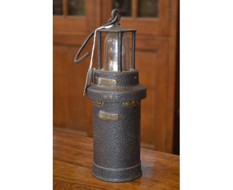 An early battery powered cast iron colliery lamp. No S392